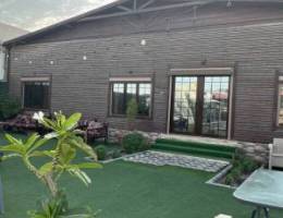  استراحة الكوخ الخشبي  للايجار اليومي الهجن كبد 