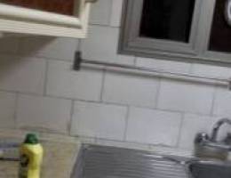  مقابل حولي شارع المغرب السريع بدون اصنصير الدور الثاني يوجد بها سطح 